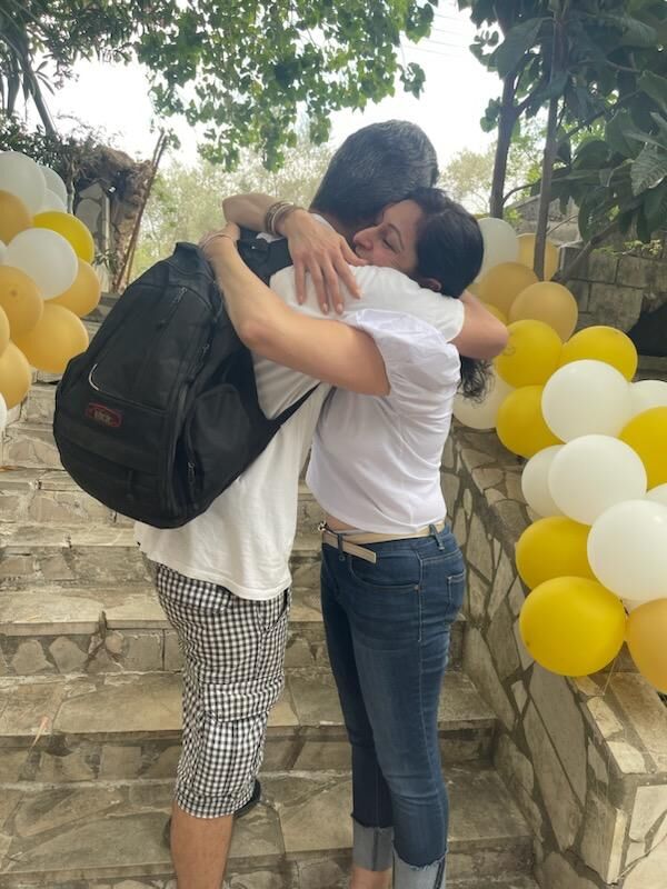 Fadia Makdisi embracing her nephew